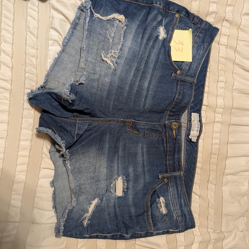 torrid distressed blue denim jean shorts